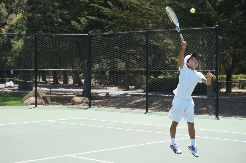 Alex Furukawa nails an overhead at Laguna Blanca Tennis Camp 2014